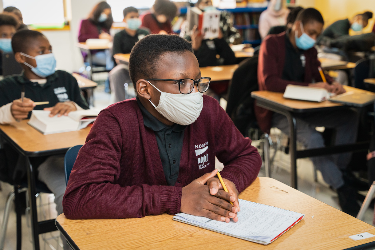 Students sit at desks at Nuasin Next Generation Charter School