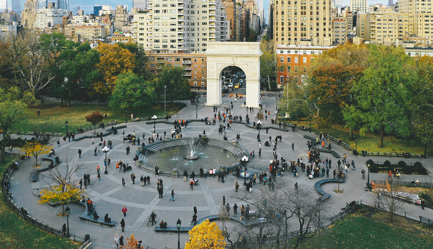 The NYU campus seen from above with student walking between the campus buildings.