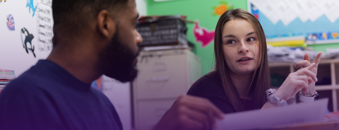 Resident and teaching mentor in conversation.